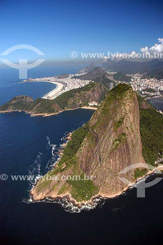  Aerial view of Sugar Loaf Mountain with Copacabana beach and Rio de Janeiro city mountains in the backround - Rio de Janeiro state - Brazil 