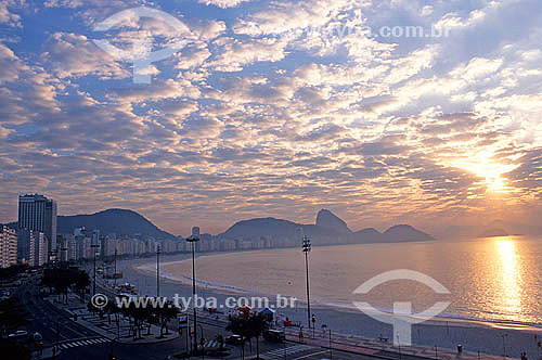  Copacabana beach at sunrise with Sugar Loaf(*) Mountain in the background - Rio de Janeiro city - Rio de Janeiro state - Brazil  *Commonly called Sugar Loaf Mountain, the entire rock formation also includes Urca Mountain and Sugar Loaf itself (the t 