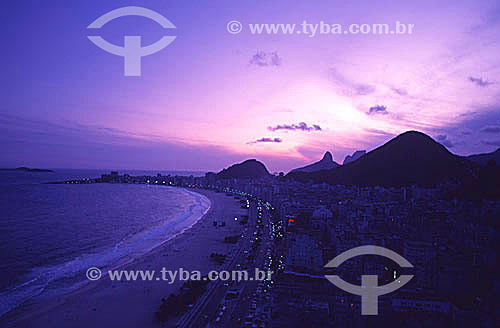  Aerial view of Copacabana Beach with Morro dos Dois Irmaos (Two Brothers Mountain) in the background at sunset - Rio de Janeiro city - Rio de Janeiro state - Brazil 