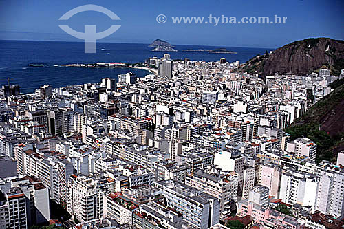  Aerial view of buildings in the neighborhood of Copacabana with the Forte de Copabacana (Copacabana Fort) jutting into the Atlantic Ocean to the left and Cagarras Island in the background - Rio de Janeiro city - Rio de Janeiro state - Brazil 