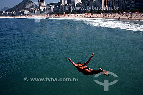 Man diving into the Atlantic Ocean on Copacabana Beach - Rio de Janeiro city - Rio de Janeiro state - Brazil 