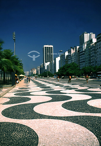  Copacabana Sidewalk with building in the background - Rio de Janeiro city - Rio de Janeiro state - Brazil  (*)The Atlantica Avenue was inaugurated in 1906 with only one track. The actual form is from the 70`s and the project is from Roberto Burle Ma 