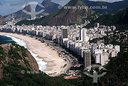 Overview of Copacabana Beach as seen from Morro do Leme (Leme Mountain) showing the beach, the Av. Atlantica (Atlantic Avenue), and above the buildings in the background, Morro dos Dois Irmaos (Two Brothers Mountain) and Rock of Gavea* - Rio de Jane 