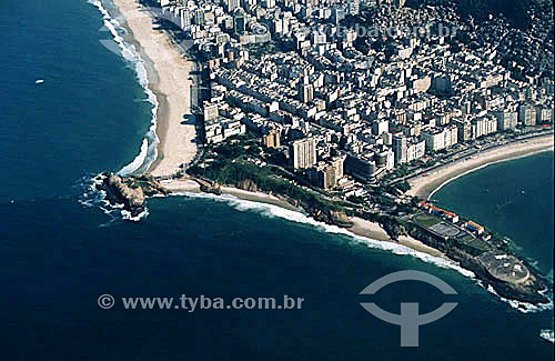 Aerial view of the small neighborhood of Arpoador, which connects Ipanema on the left to Copacabana on the right. From left to right: the far end of Ipanema Beach known as Arpoador, Rock of Arpoador, Praia do Diabo (Devil Beach), three private beach 