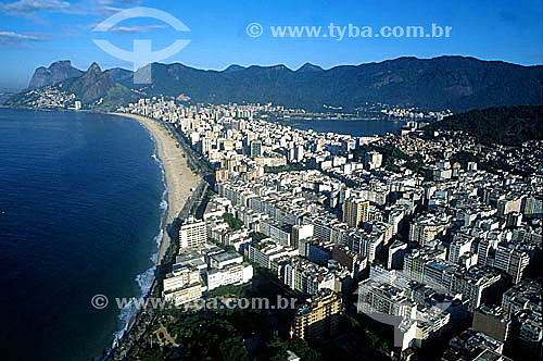  From left to right: Rock of Gavea; Morro dos Dois Irmaos (Two Brothers Mountain); the beaches of Leblon and Ipanema (1); with Lagoa Rodrigo de Freitas (Rodrigo de Freitas Lagoon) (2) to the right and the mountain skyline in the background- Rio de Ja 