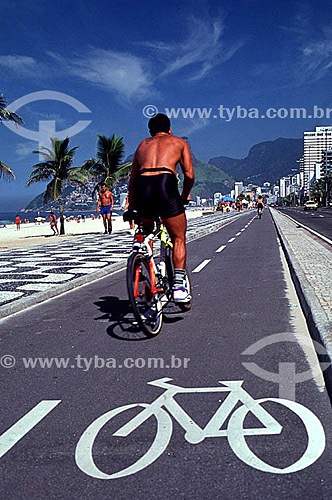  A cyclist on the bicycle path on Ipanema Beach - Rio de Janeiro city - Rio de Janeiro state - Brazil 