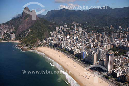 Aerial view of Morro Dois Irmaos (Two Brothers Mountain)*, with the Favela do  Vidigal (Vidigal Slum) on the left  hillside and Leblon neighbourhood to the right - Rio de Janeiro city - Rio de Janeiro state - Brazil   *National Historic Site since 0 