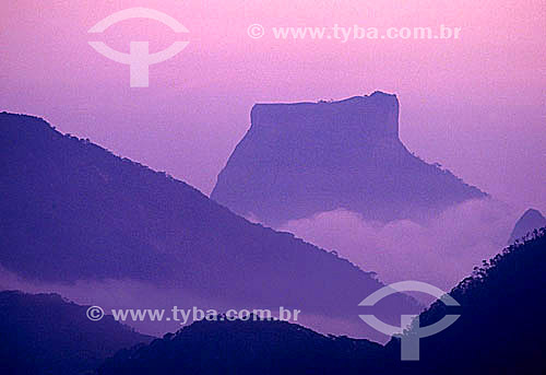  View of Rock of Gavea (1) at sunset with Floresta da Tijuca (Tijuca Forest) (2) in the foreground - Rio de Janeiro city - Rio de Janeiro state - Brazil  (1) The Rock of Gavea is a National Historic Site since 08-08-1973.  (2) National Historic Site  