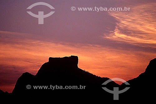  Silhouette of Rock of Gavea* at sunset - Rio de Janeiro city - Rio de Janeiro state - Brazil  * The Rock of Gavea is a National Historic Site since 08-08-1973. 