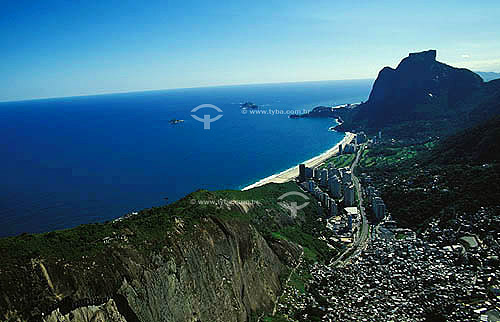  Aerial view of Sao Conrado neighborhood with the Rocinha Slum and Gavea Rock(*) in the background - Rio de Janeiro city - Rio de Janeiro state - Brazil   (*) Gavea Rock is a  National Historical Site since 08-08-1973 