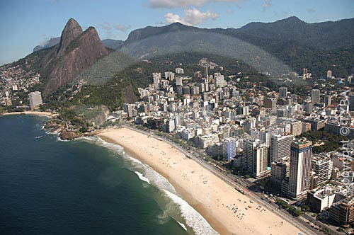  Aerial view showing the Morro dos Dois Irmaos (Two Brothers Mountain) with a part of the Favela do Vidigal (Vidigal Slum) in the background (at the left), and the Leblon Beach - Rio de Janeiro city - Rio de Janeiro state - Brazil  