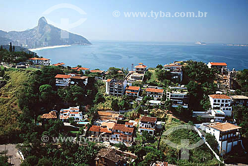  Houses on Joa mountain with Sao Conrado Beach and  Dois Irmaos Mountain (Two Brothers Mountain) in the background - Rio de Janeiro city - Rio de Janeiro state - Brazil 