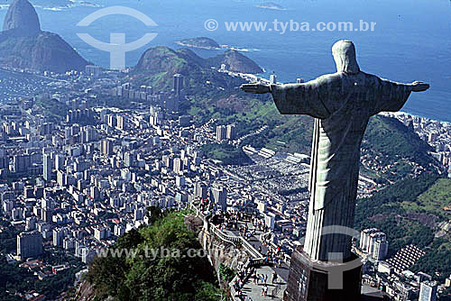  Aerial view of the Cristo Redentor (Christ the Redeemer) overlooking the buildings of the neighborhood of Botafogo, with Sugar Loaf Mountain in the background - Rio de Janeiro city - Rio de Janeiro state - Brazil 