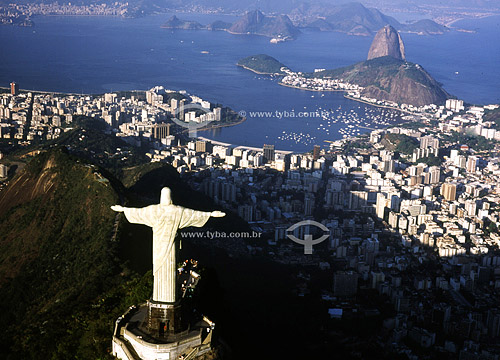  Aerial view of Christ the Redeemer statue over Corcovado Hill with the buildings of Botafogo cove , Sugar Loaf , the entrance of Guanabara Bay and Niteroi city in the background - Rio de Janeiro city - Rio de Janeiro state - Brazil 