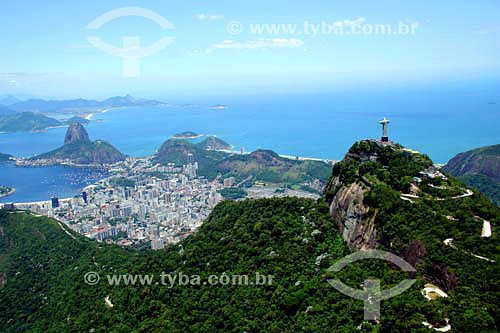  Aerial view of Cristo Redentor (Christ the Redeemer) with the buildings of Botafogo Cove, Sugar Loaf Mountain and the entrance to Guanabara Bay in the background - Rio de Janeiro city - Rio de Janeiro state - Brazil - November 2006 