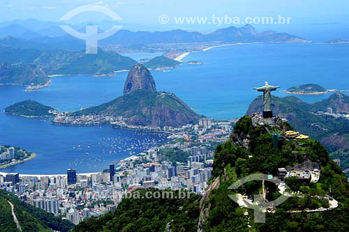  Aerial view of Cristo Redentor (Christ the Redeemer) with the buildings of Botafogo Cove, Sugar Loaf Mountain and the entrance to Guanabara Bay in the background - Rio de Janeiro city - Rio de Janeiro state - Brazil - November 2006 