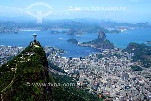  Aerial view of Christ the Redeemer statue over Corcovado Hill with the buildings of Botafogo cove , Sugar Loaf , the entrance of Guanabara Bay and Niteroi city in the background - Rio de Janeiro city - Rio de Janeiro state - Brazil - November 2006 