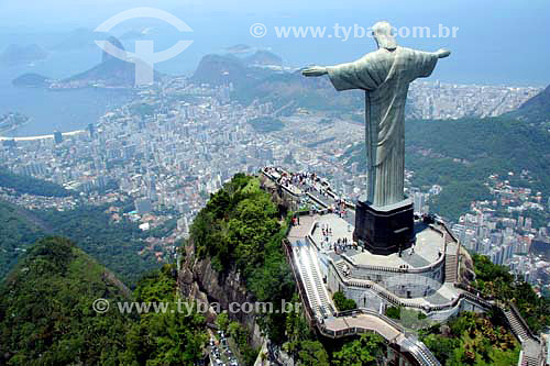  Aerial view of Cristo Redentor (Christ the Redeemer) with the buildings of Botafogo Cove, Sugar Loaf Mountain and the entrance to Guanabara Bay in the background - Rio de Janeiro city - Rio de Janeiro state - Brazil - November 2006 