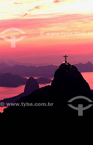  Silhouette Cristo Redentor (Christ the Redeemer) with Sugar Loaf Mountain just to the left - Rio de Janeiro city - Rio de Janeiro state - Brazil 