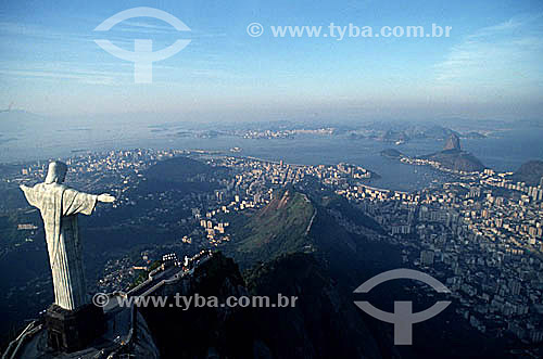  Aerial view of Cristo Redentor (Christ the Redeemer) overlooking the buildings of the neighborhoods of Botafogo, Flamengo, Gloria, and and the center of Rio de Janeiro city, with Sugar Loaf Mountain  - Rio de Janeiro city - Rio de Janeiro state (RJ) - Brazil