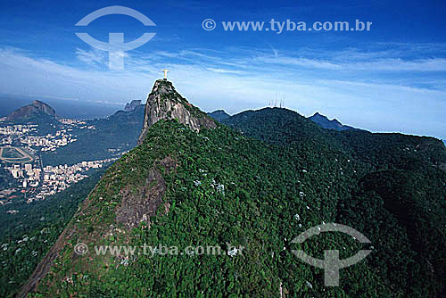  Christ the Redeemer at Morro do Corcovado (Corcovado Mountain), with the Jockey Club below to the far left and Morro Dois Irmaos (Two Brothers Mountain) and Rock of Gavea in the background to the left - Rio de Janeiro city - Rio de Janeiro state - B 