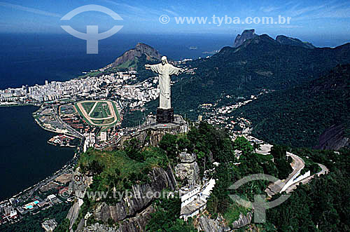  Aerial view of the Christ the Redeemer with part of Lagoa Rodrigo de Freitas (Rodrigo de Freitas Lagoon) (1) to the left and the buildings of the neighborhood of Ipanema behind it, the Jockey Club to the right of the lagoon, and Morro Dois Irmaos (T 