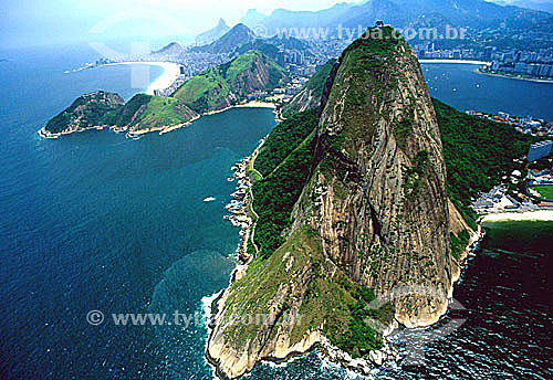  Aerial view showing Sugar Loaf Mountain (1), with Praia Vermelha (Red Beach) and Morro da Babilonia (Babylonia Mountain) (2) on the left, followed by Copacabana Beach, Morro dos Dois Irmaos (Two Brothers Mountain) and Rock of Gavea in the background 