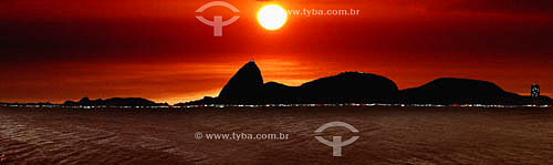  Panoramic view of Sugar Loaf Mountain (1) as seen from Aterro do Flamengo (2) at sunrise - Rio de Janeiro city - Rio de Janeiro state - Brazil  (1) Commonly called Sugar Loaf Mountain, the entire rock formation also includes Urca Mountain and Sugar  