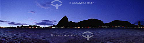  Panoramic view of Sugar Loaf Mountain (1) as seen from Aterro do Flamengo at sunrise - Center of Rio de Janeiro city - Rio de Janeiro state - Brazil  (1) Commonly called Sugar Loaf Mountain, the entire rock formation also includes Urca Mountain and  