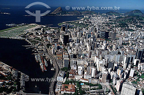 Aerial view of Rio de Janeiro´s city center, with the city port in the foreground on the lower left, Santos Dumont Airport to the upper left, and Sugar Loaf Mountain in the background - Rio de Janeiro city - Rio de Janeiro state - Brazil 