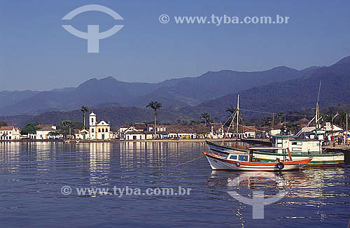  The city of Parati (1) as seen from Parati Bay and the Igreja de Santa Rita (Santa Rita Church) (2) and boats in the foreground - Costa Verde (Green Coast) - Rio de Janeiro state - Brazil  (1) The historic colonial city of Parati dates from the end  