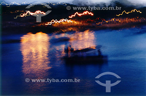  Fisherman boat and lights of Buzios city by night - Costa do Sol (Sun Coast) - Regiao dos Lagos (Lakes Region) - Rio de Janeiro state - Brazil 