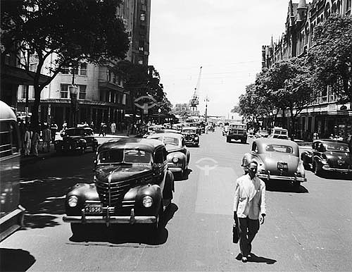  Man walking at Rio Branco Avenue in 12/19/1949 - Center of Rio de Janeiro city - Brazil 