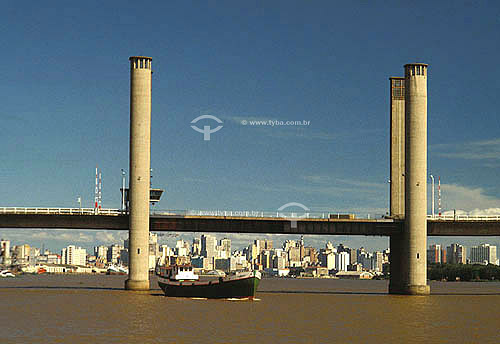  Boat under the bridge of Guaiba River - Porto Alegre city - Rio Grande do Sul state - Brazil 