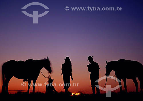  Silhouette of gauchos*  with horses - Rio Grande do Sul state - Brazil  *People from south of Brazil 