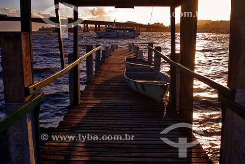  Small pier in Florianopolis city with the new bridge on thebackground - Santa Catarina state - Brazil 