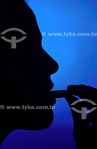 Silhouette of woman`s profile eating (Palate) 