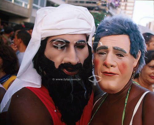  Couple dressed in costumes for carnival during the Ipanema`s Band parade in Carnival 2003, representing Osama Bin Laden to the left and George W. Bush to the right - Rio de Janeiro city - Rio de Janeiro state - Brazil 