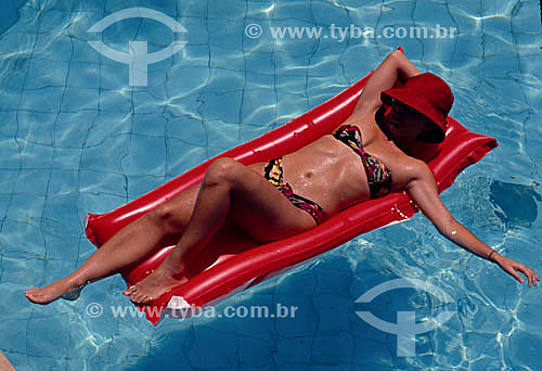  Woman in the swimming pool - Buzios village - Rio de Janeiro state - Brazil 