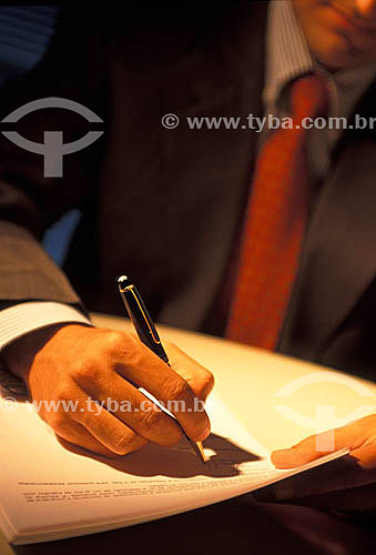  Executive signing a document 