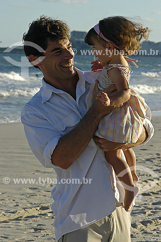  Father with daughter at beach 