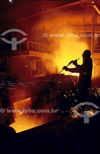  Silhouette of a worker at CSN  - National Siderurgical Company - Volta Redonda city - Rio de Janeiro state - Brazil 