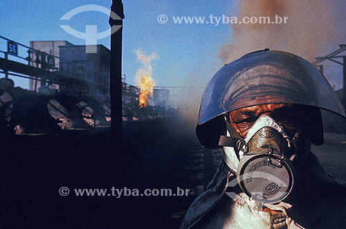  Worker of CSN using a mask - National Siderurgical Company - Volta Redonda city - Rio de Janeiro state - Brazil 