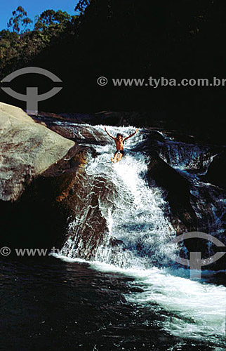  Boy at Maromba`s Slide waterfall - Visconde de Maua - Rio de Janeiro state - Brazil 