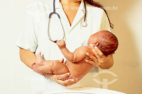  Nurse with a baby in the arms 