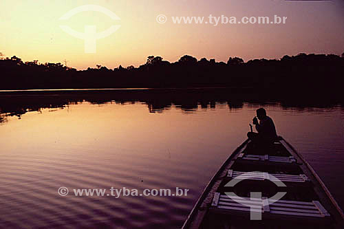  Man on the boat in the Anavilhanas Islands - Amazon Region - Brazil 