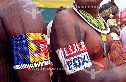  Indians, taking part at the swearing ceremony of the  president elected Luiz Inacio Lula da Silva, wearing traditional  bracelets in honor of Workers Party and Lula - Brasilia city* - Federal District of Brazil - 01/01/2003  *The city of Brasilia is 