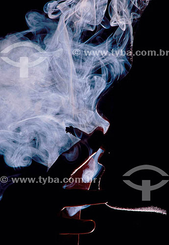 Silhouette of a woman smoking majijuana - Brazil 