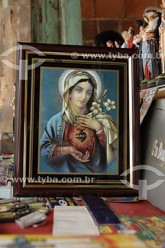  Religious image of Nossa Senhora da Conceição in a shop -  Porto das Caixas district - Itaboraí city - Rio de Janeiro state- Brazil - january, 2007  