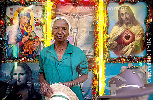  Old lady posing in a photo scenery in religious festival - Bom Jesus da Lapa city - Bahia state - Brazil 